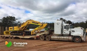 excavator transport cost