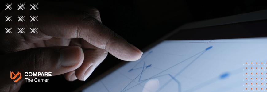 Close-up of a hand interacting with a tablet displaying financial analytics, illustrating the importance of lead tracking for a transport company's bottom line