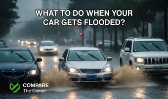 Flooded car in high water on a street due to heavy rain.